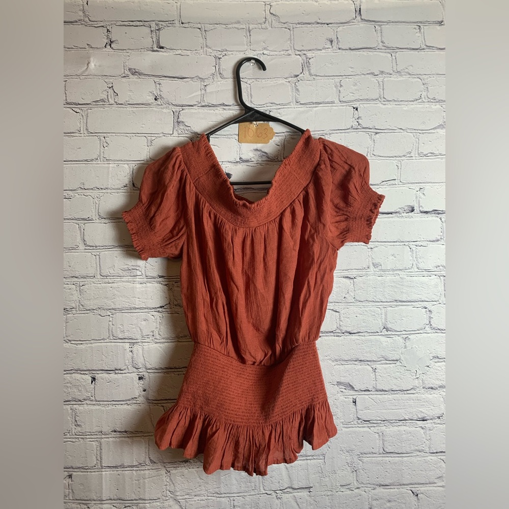 Flattering orange fall top!